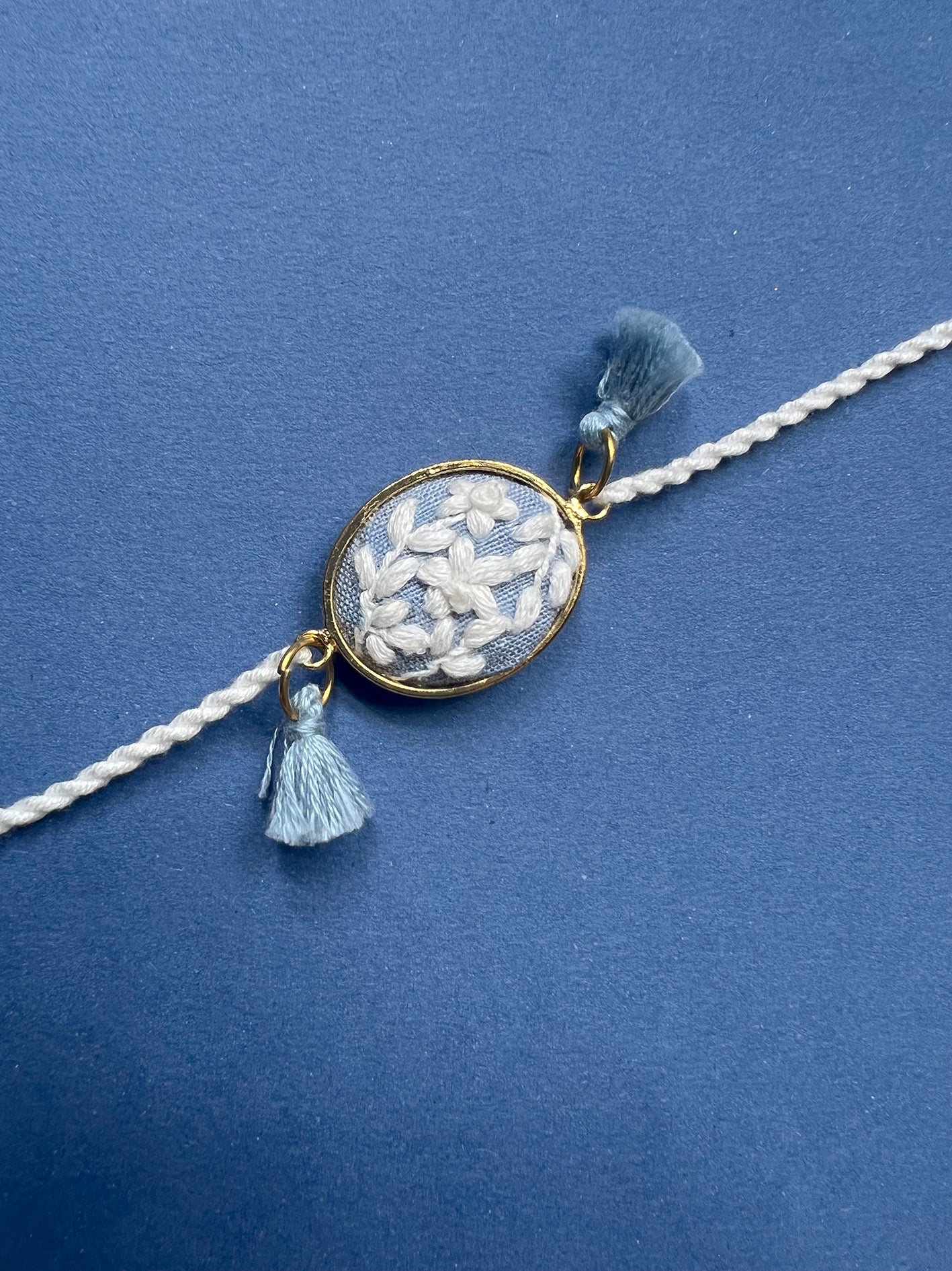 Blue & White Oval Rakhi