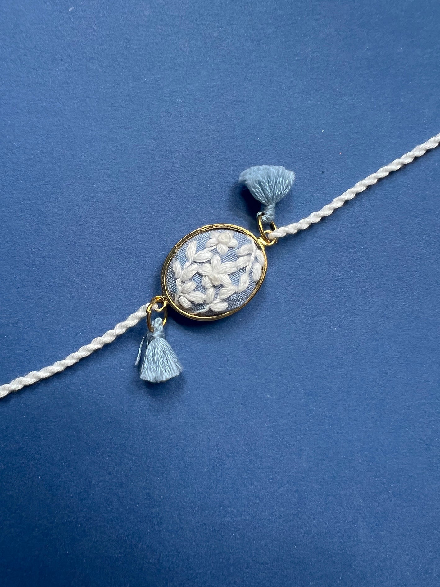 Blue & White Oval Rakhi