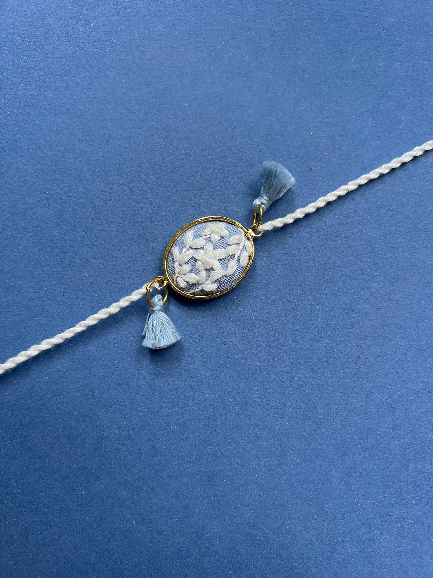 Blue & White Oval Rakhi