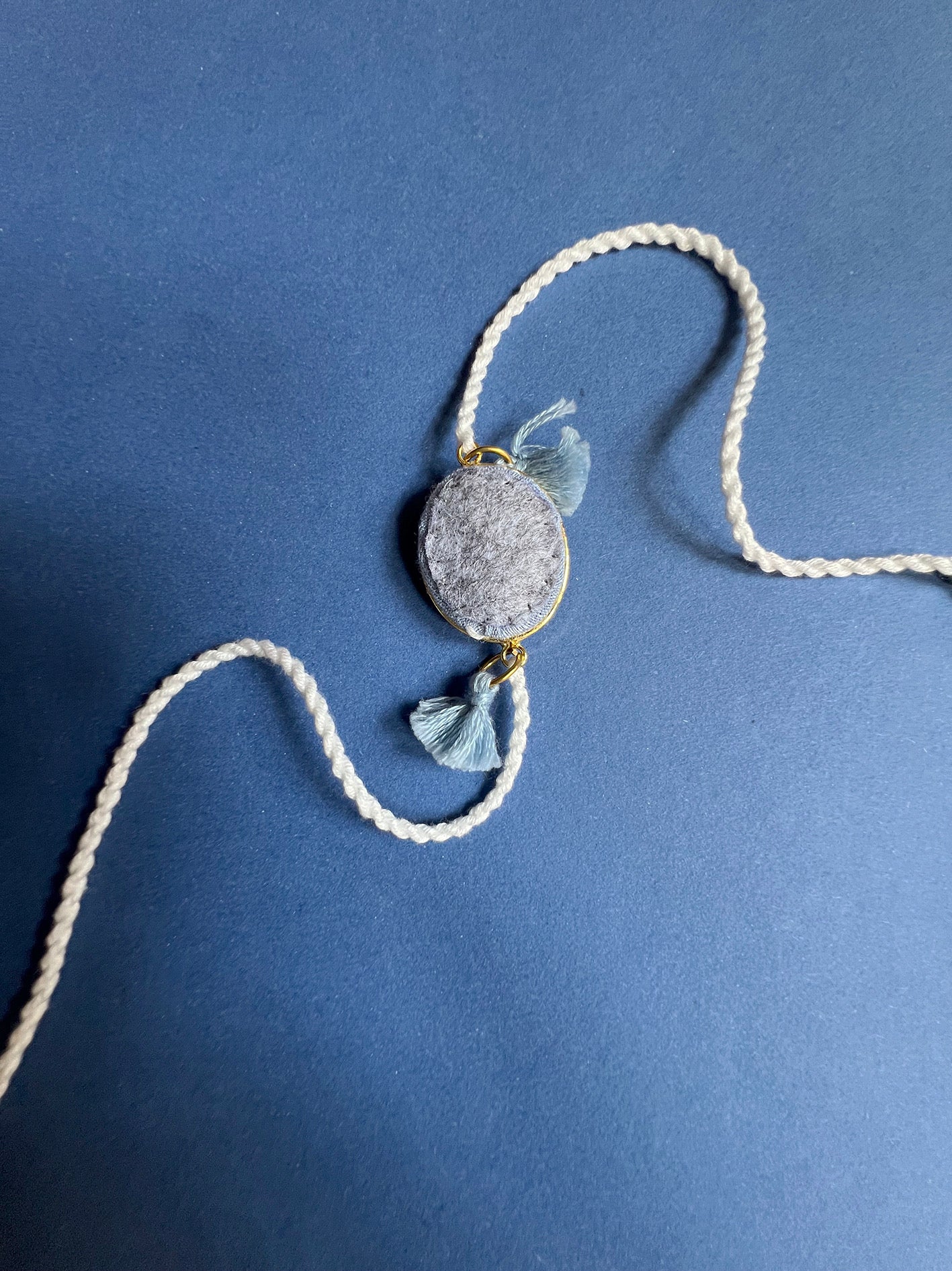 Blue & White Oval Rakhi