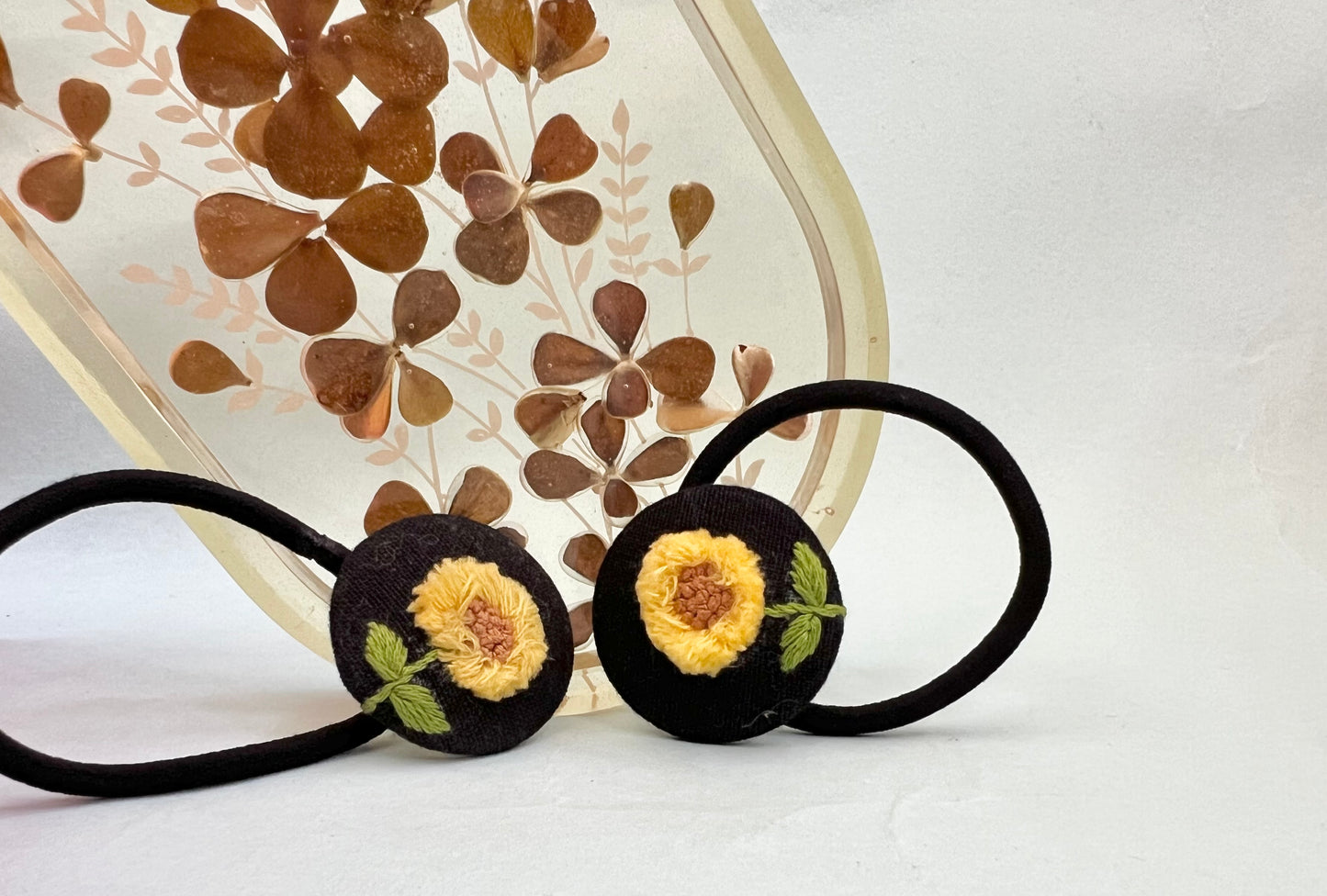 Sun bloom hand embroidered hair tie | Black