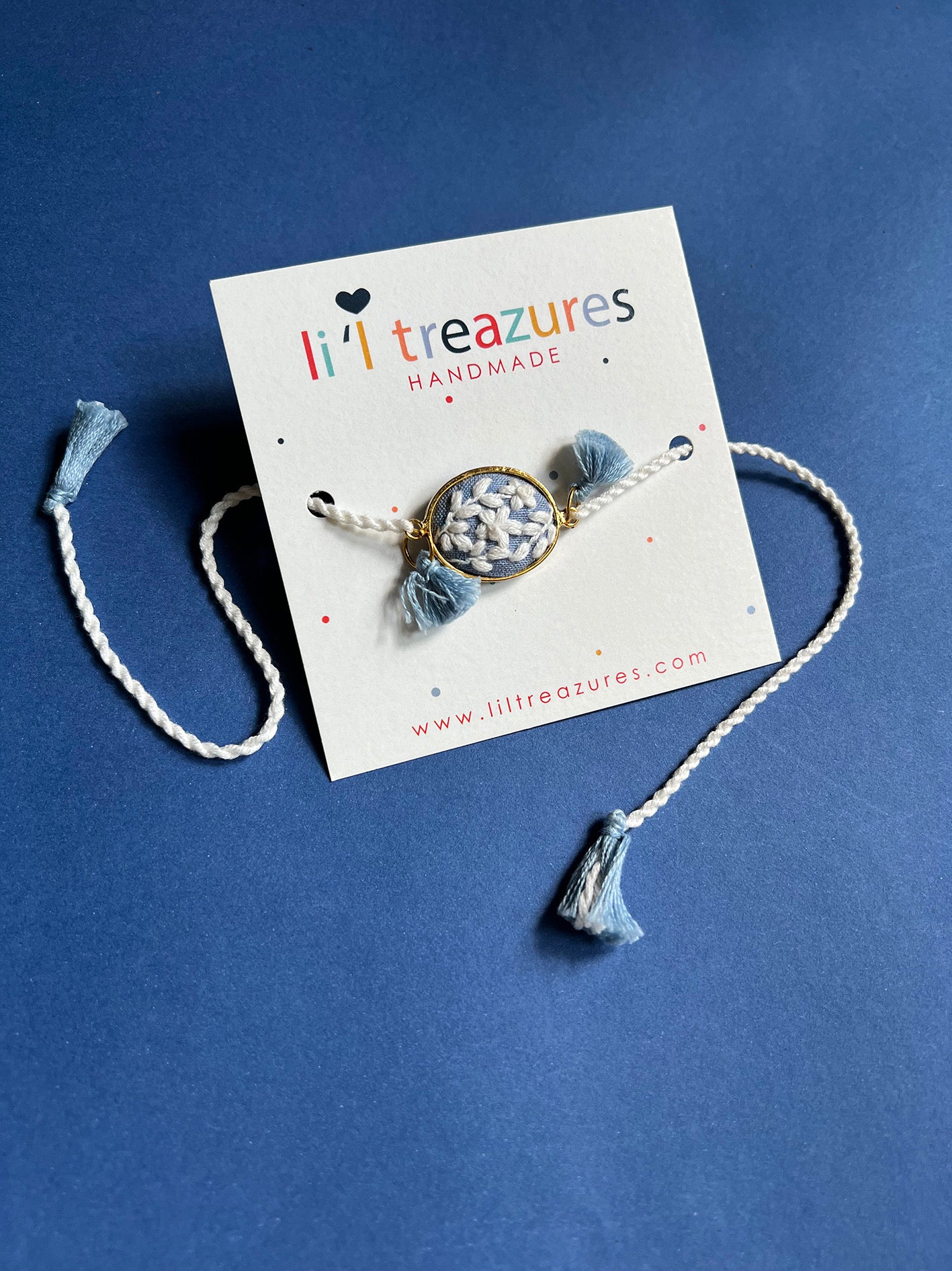 Blue & White Oval Rakhi